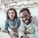 Two people reviewing paperwork together
